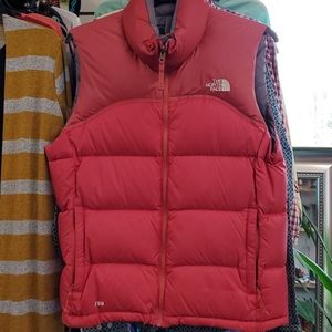 The North Face red puffer vest